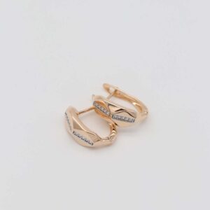 Elegant gold-plated hoop earrings with a geometric design and subtle crystal accents, displayed on a plain background.