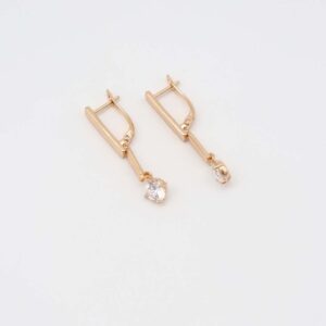 Rhodium plated dangle earrings with a sleek bar design and sparkling crystal pendants, displayed on a plain white background.