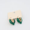 Emerald Wave Drop Earrings with deep emerald resin and flowing gold-plated accents.