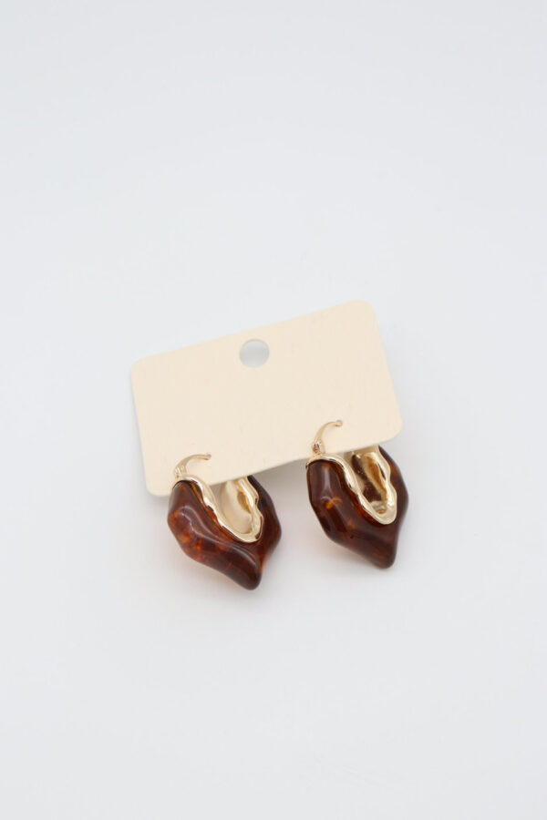 Amber Wave Drop Earrings with warm amber resin and flowing gold-plated accents.
