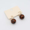 Tortoise Sphere Drop Earrings with glossy tortoise-shell patterned resin spheres and polished gold-plated hoops.