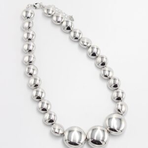 Lustrous Silver Bead Necklace with large polished silver-tone beads and adjustable lobster clasp.
