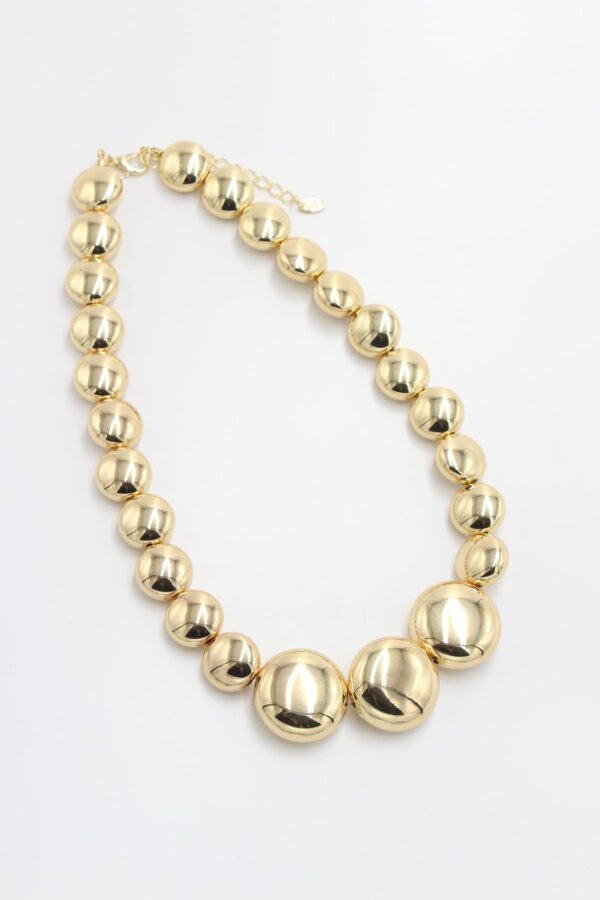 Radiant Gold Bead Necklace with polished gold-tone beads and adjustable lobster clasp.