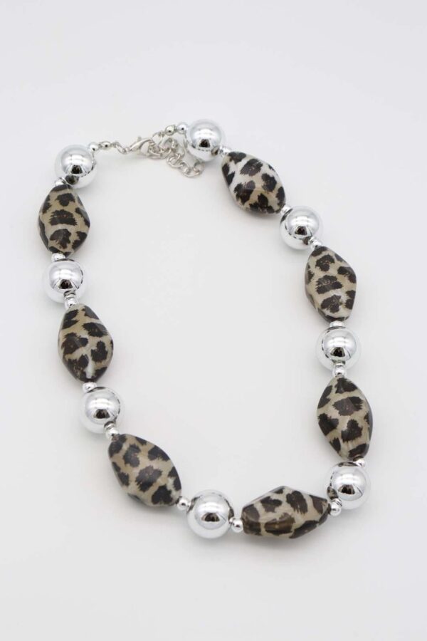 Silver Leopard Print Necklace with alternating silver and leopard-patterned geometric beads.