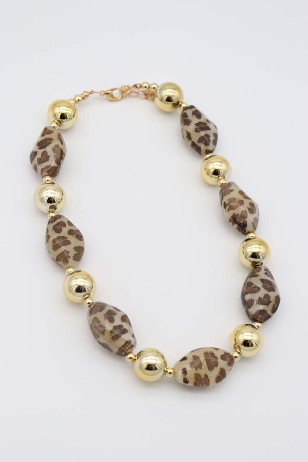 Gold Leopard Print Necklace with geometric leopard-patterned and gold beads.