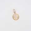 Gold pendant featuring a crystal-encrusted letter 'B' in a circular frame