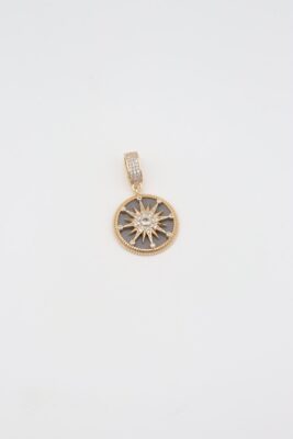 Gold round pendant with grey enamel and star design
