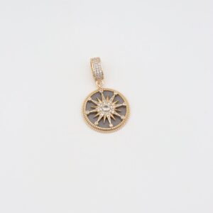 Gold round pendant with grey enamel and star design