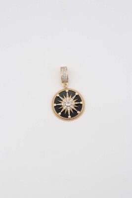 Gold round pendant with black enamel and star design