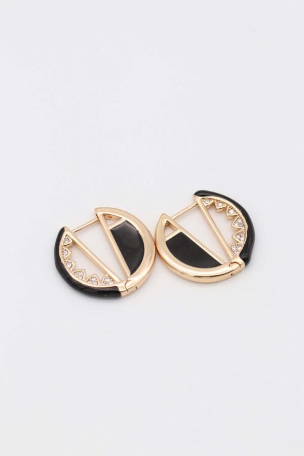 Geometric black and gold hoop earrings with crystal accents