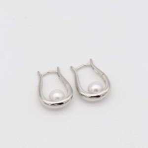Silver pearl drop earrings with modern curved design