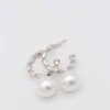 Textured silver hoop earrings with pearl drop