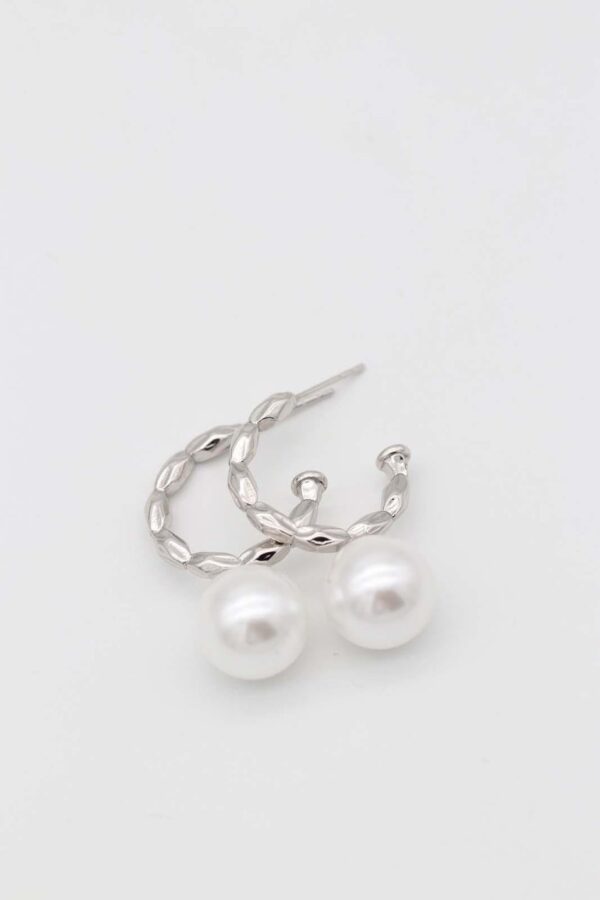 Textured silver hoop earrings with pearl drop
