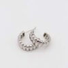 Silver sculpted hoop earrings with bold ridges