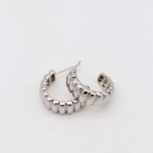 Silver sculpted hoop earrings with bold ridges