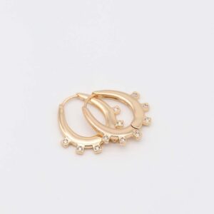 Gold modern hoop earrings with unique design
