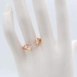 Gold open-ended ring with diamond-shaped crystals