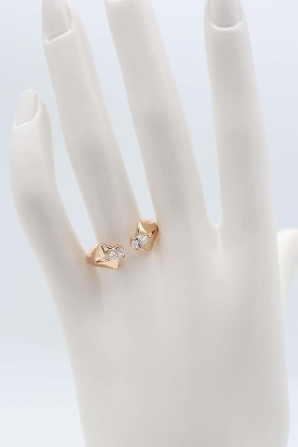 Gold open-ended ring with diamond-shaped crystals