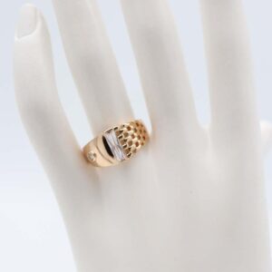 Gold ring with grid design and crystal detail