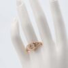 Gold heart-shaped ring with starburst design