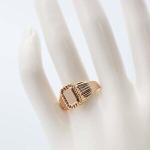 Elegant gold openwork ring with beaded edges
