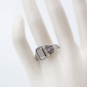 Elegant silver openwork ring with beaded edges